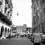 Via E. Filiberto, sulla destra i Taxi in attesa, in fondo Piazza Garibaldi, fotografia del 1950. (Massimo Pastore)